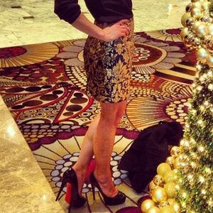 Gold and black embroidered mini skirt